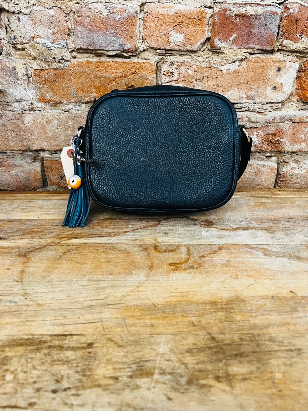 Black Pebbled Crossbody Bag with Tassel